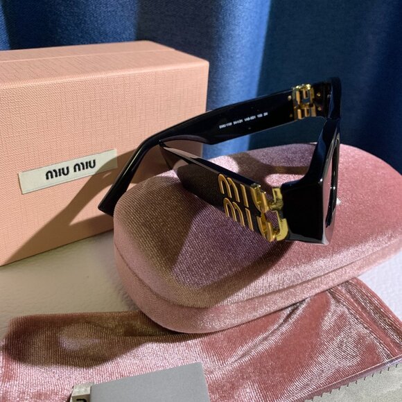Miu Miu Black Oval Sunglasses • Gold Logo Statement main image 9